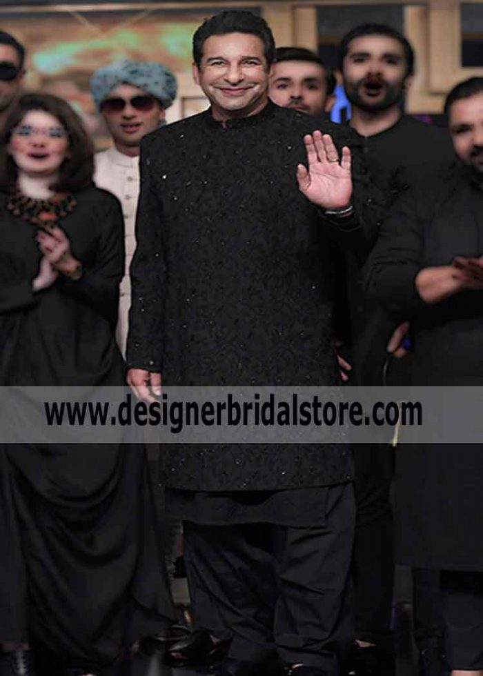 wasim akram in black long sherwani
